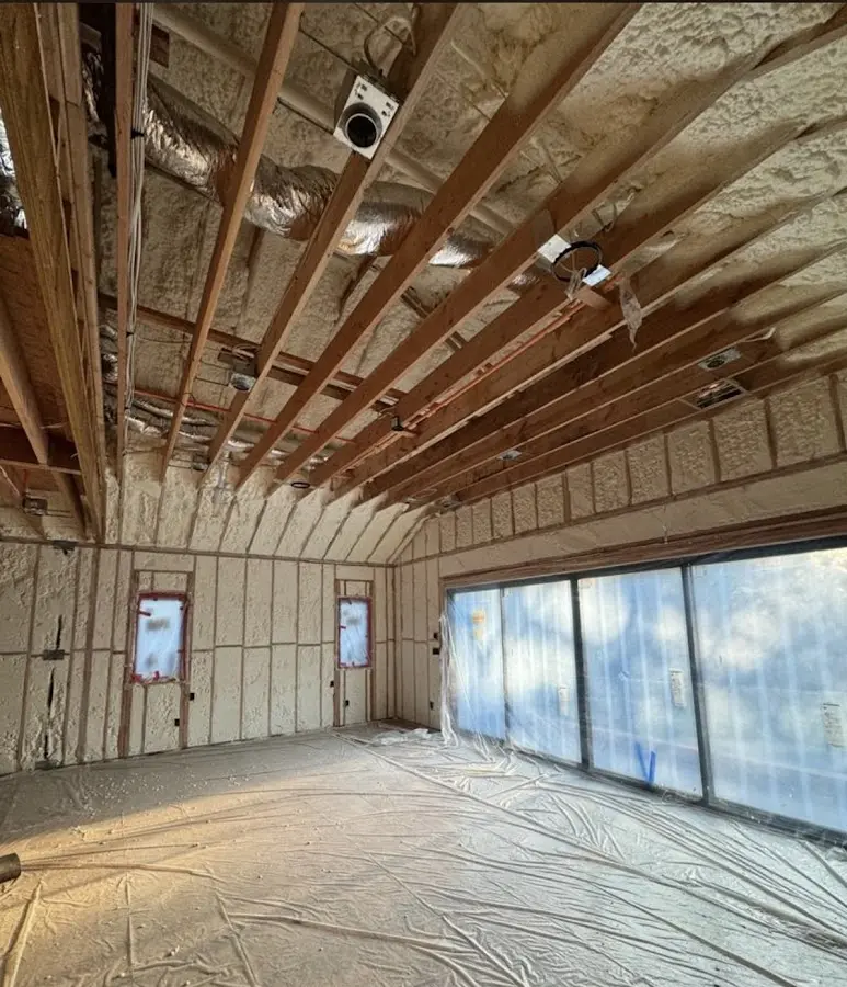Interior walls and ceiling insulated with spray foam during new construction in Garden Grove